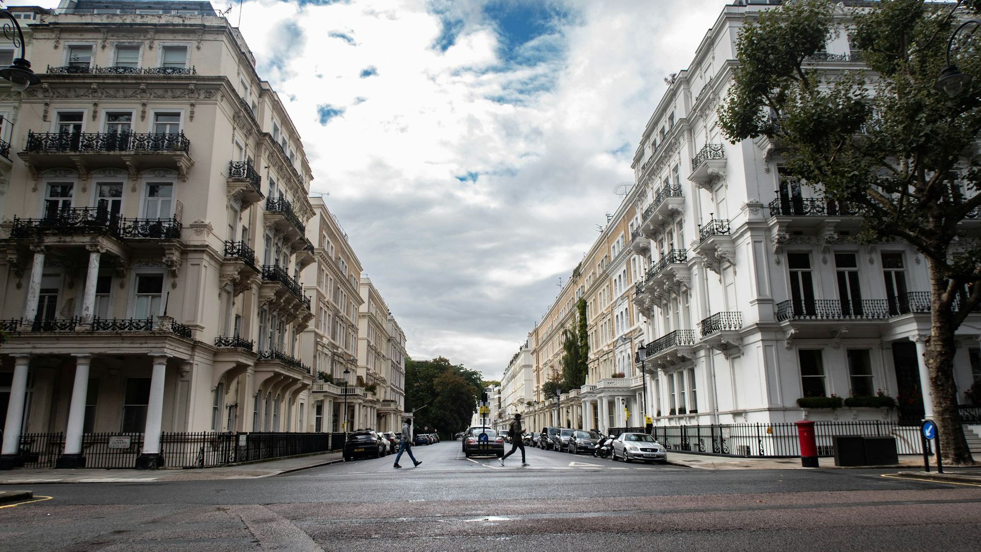 A long South Kensington street of white stucco terraces